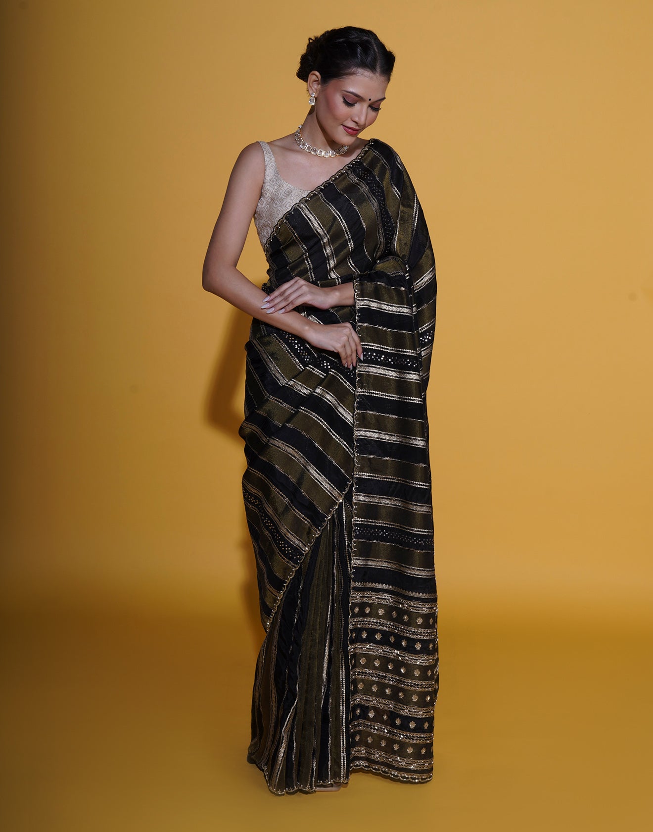 Black And Antique Gold Stripped Embellished Saree