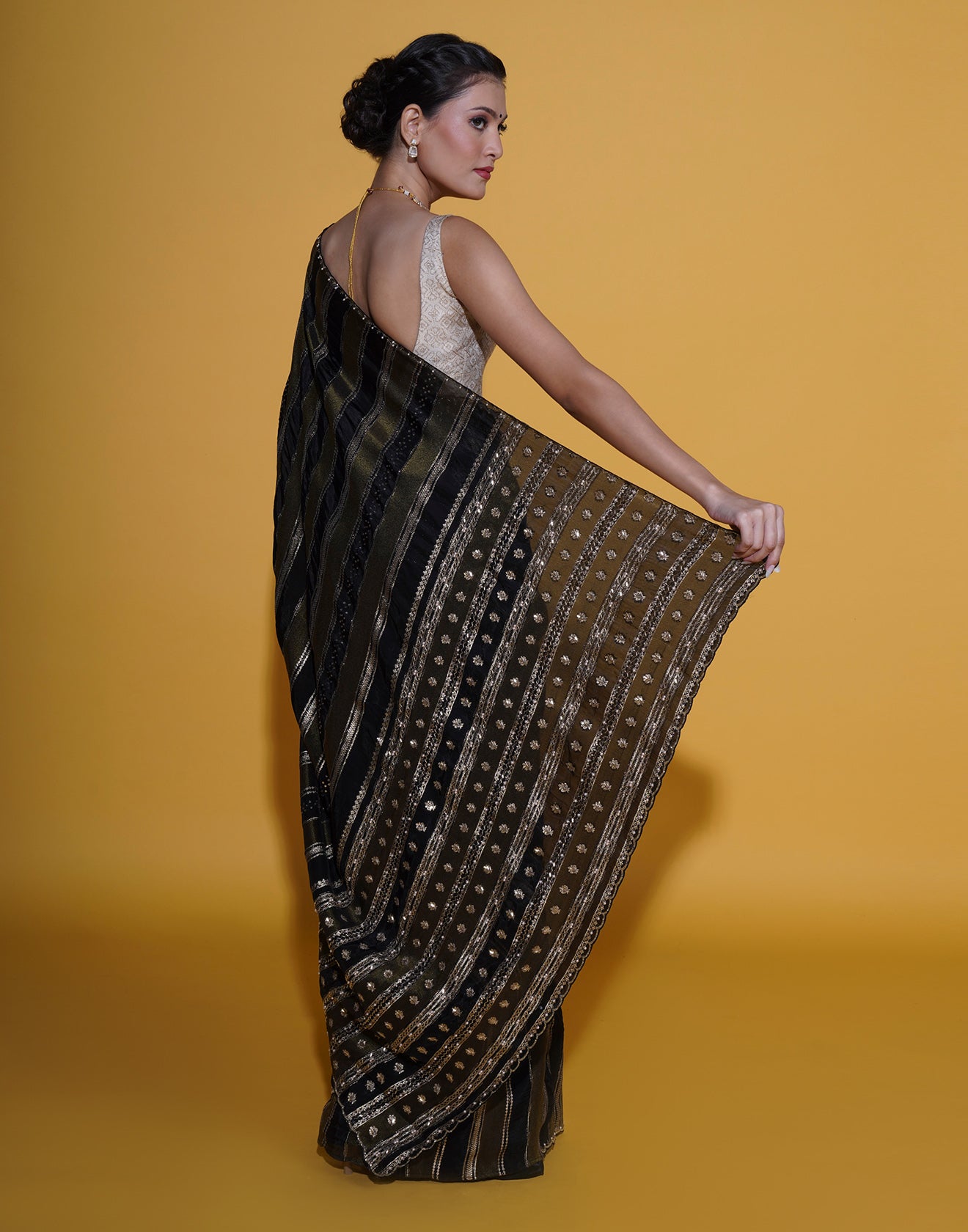 Black And Antique Gold Stripped Embellished Saree