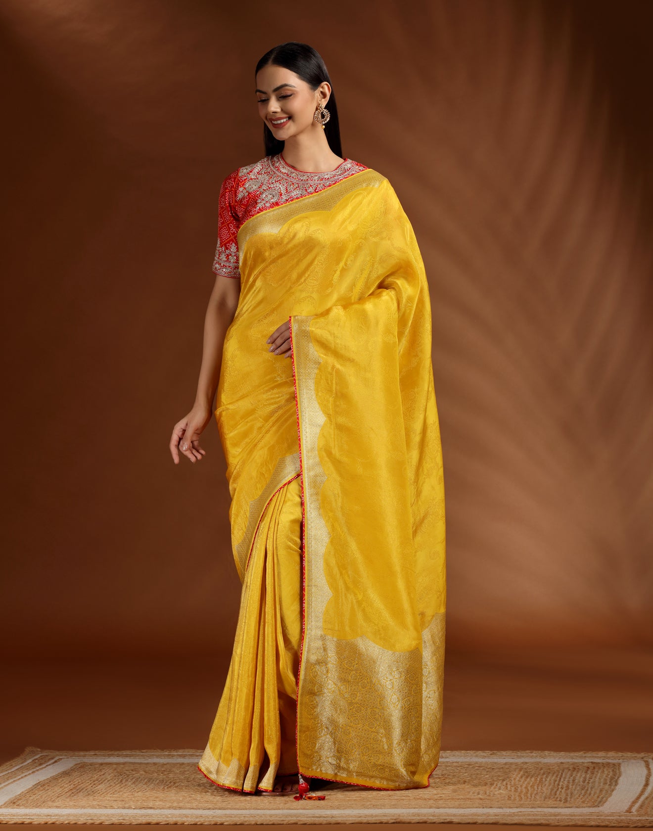 Marigold Magic Dola Silk Saree With Contrast Red Bandhej Stitched Blouse