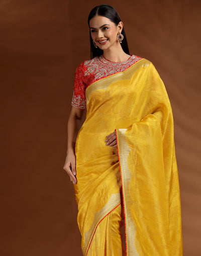 Marigold Magic Dola Silk Saree With Contrast Red Bandhej Stitched Blouse