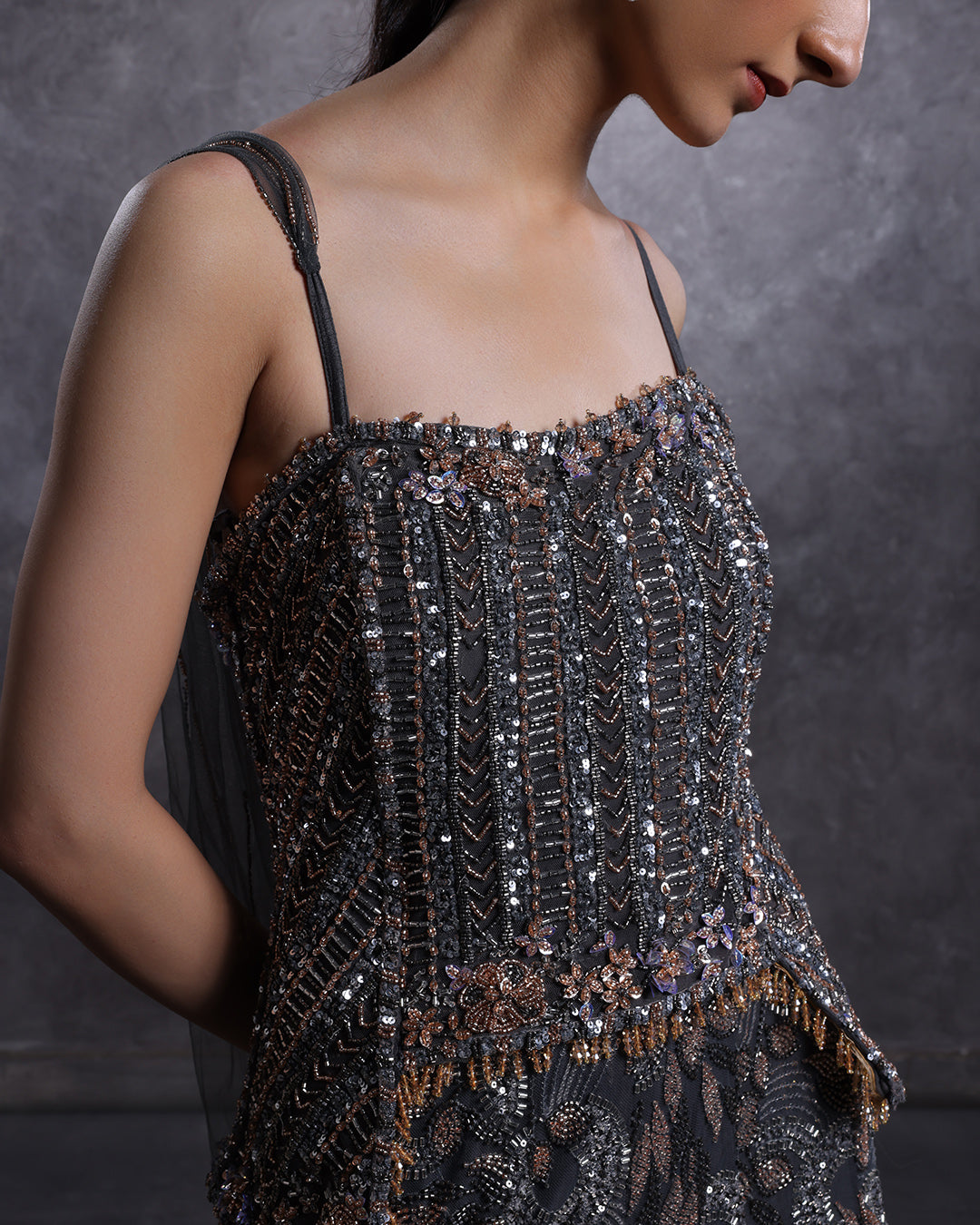 Charcoal Hues Embellished Peplum Fit And Flare Gown