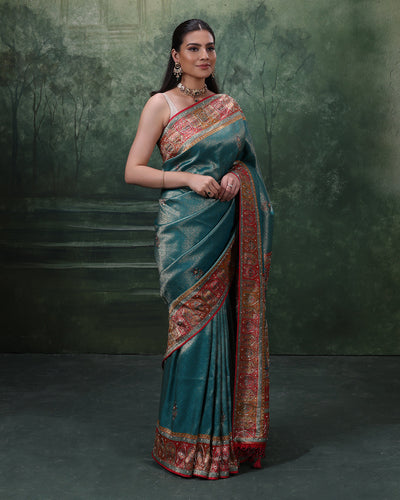 Turquoise Shimmer Silk Saree With Multicolor Embroidered Border And Unstitched Blouse Fabric