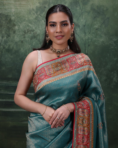 Turquoise Shimmer Silk Saree With Multicolor Embroidered Border And Unstitched Blouse Fabric