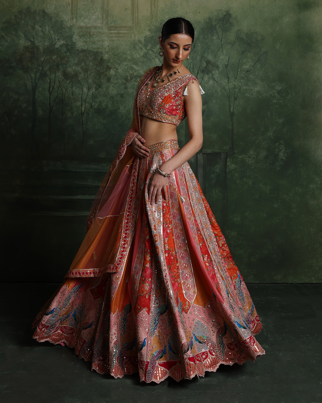 Vibrant Sunset Hues With Peacock Border Lehenga Set