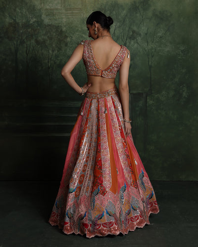 Vibrant Sunset Hues With Peacock Border Lehenga Set