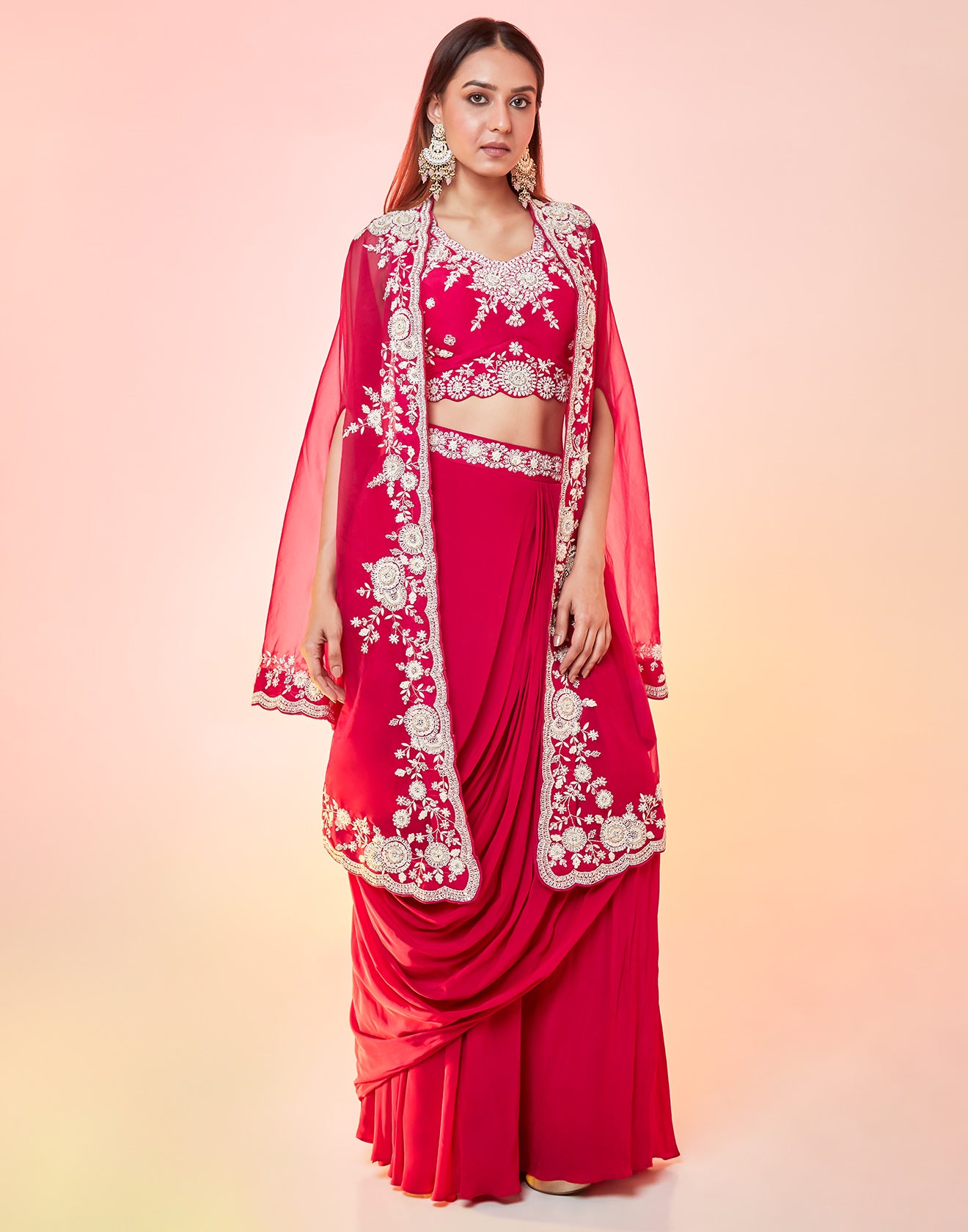 Varsity Pink Draped Draped Fusion Set With Cape Sleeves And Embroidered In Ivory